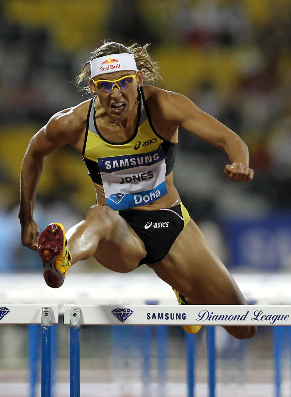 Lolo Jones of the US competes in the women's 100m hurdles at the IAAF Diamond League in Doha on May 6, 2011. AFP PHOTO/KARIM JAAFAR (Photo credit should read KARIM JAAFAR/AFP/Getty Images)