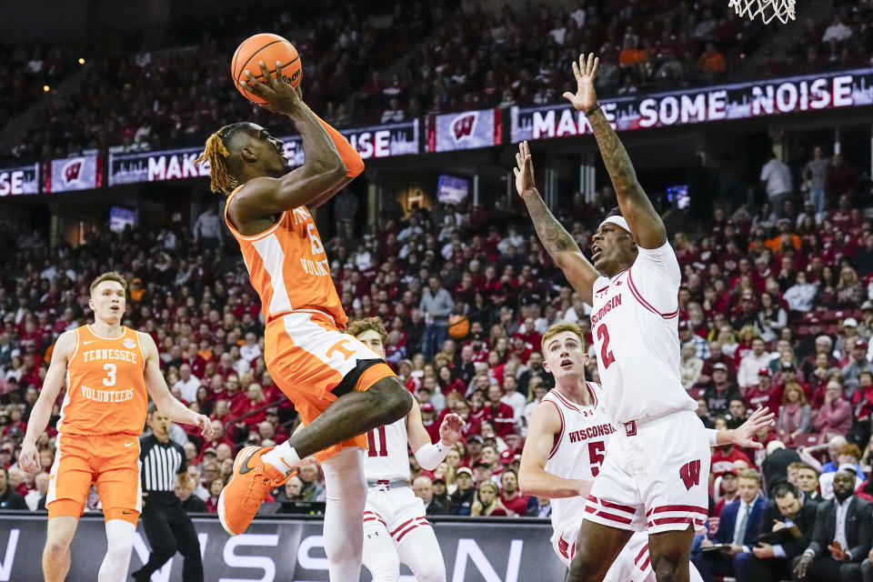 Tennessee's Jahmai Mashack (15) shoots against Wisconsin's AJ Storr (2) during the first half of an NCAA college basketball game Friday, Nov. 10, 2023, in Madison, Wis. (AP Photo/Andy Manis)