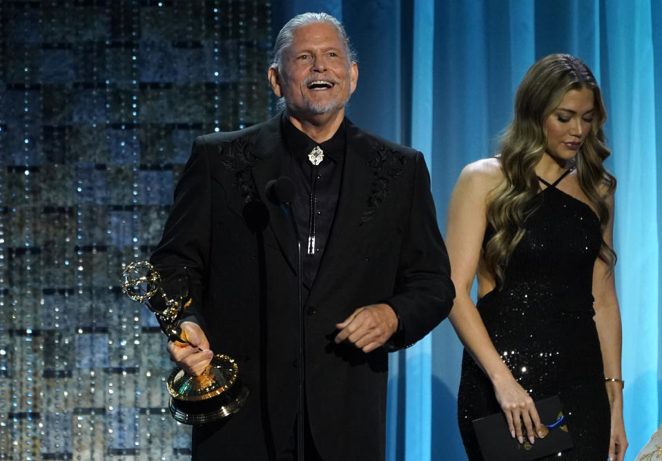 Jeff Kober accepts the award for outstanding performance by a supporting actor in a drama series for his role in "General Hospital" at the 49th annual Daytime Emmy Awards on Friday, June 24, 2022, in Pasadena, Calif. (AP Photo/Chris Pizzello)
