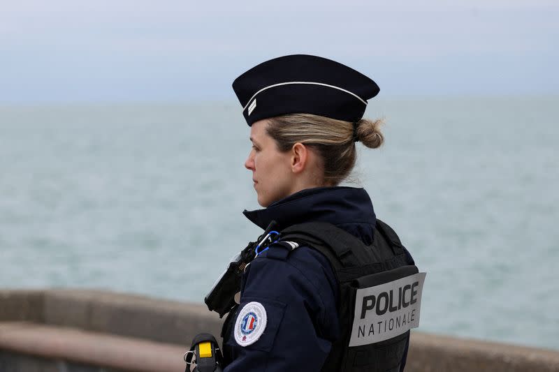 Security and rescue forces are seen on the beach of Wimereux, near Calais