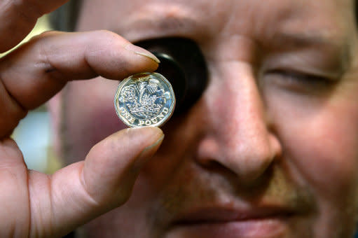 The 12-sided coin features a raft of anti-counterfeiting measures (Ben Birchall/PA Wire)