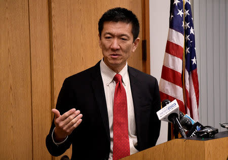 Hawaii Attorney General Douglas Chin speaks at a press conference after filing an amended lawsuit against President Donald Trump's new travel ban in Honolulu, Hawaii, March 9, 2017. REUTERS/Hugh Gentry