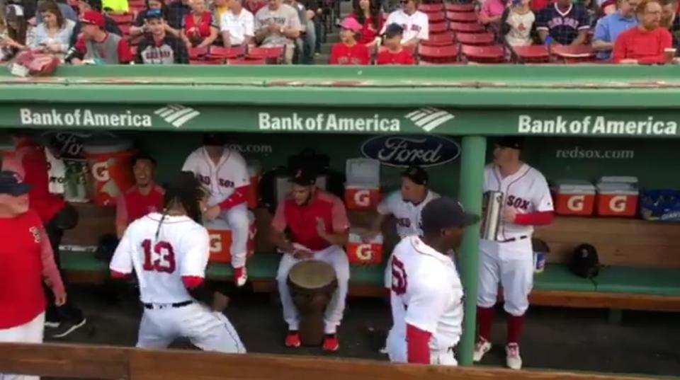 Hanley Ramirez dances in the Red Sox dugout while Eduardo Rodriguez and Brock Holt give him a beat. (Twitter/@RedSox)