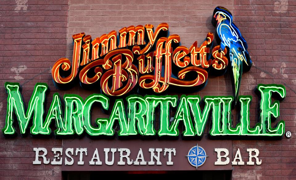A Jimmy Buffet's Margaritaville restaurant and bar is among the tourist attractions in the Lower Broadway entertainment district in Nashville, TennesseeA Jimmy Buffet's Margaritaville restaurant and bar is among the tourist attractions in the Lower Broadway entertainment district in Nashville, Tennessee