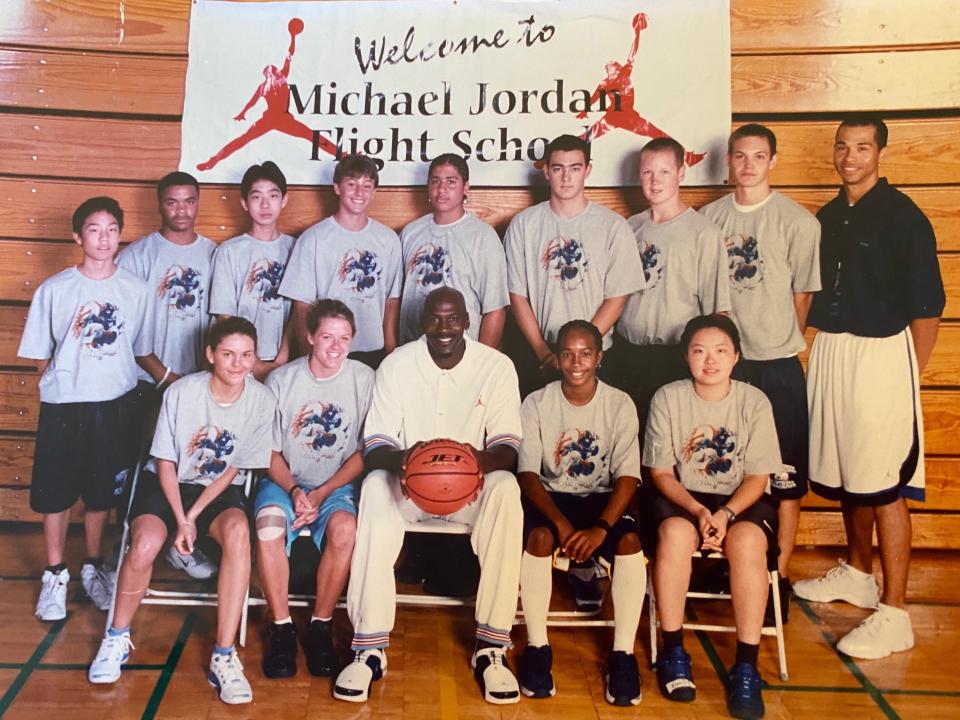 The writer (far left, first row) with her team at Michael Jordan's Flight School, 2002.