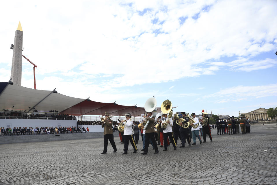 An international military band performs on Place de la Concorde during the Bastille Day military parade Friday, July 14, 2023 in Paris. India is the guest of honor at this year's Bastille Day parade, with Prime Minister Narendra Modi in the presidential tribune alongside French President Emmanuel Macron. (AP Photo/Aurelien Morissard)