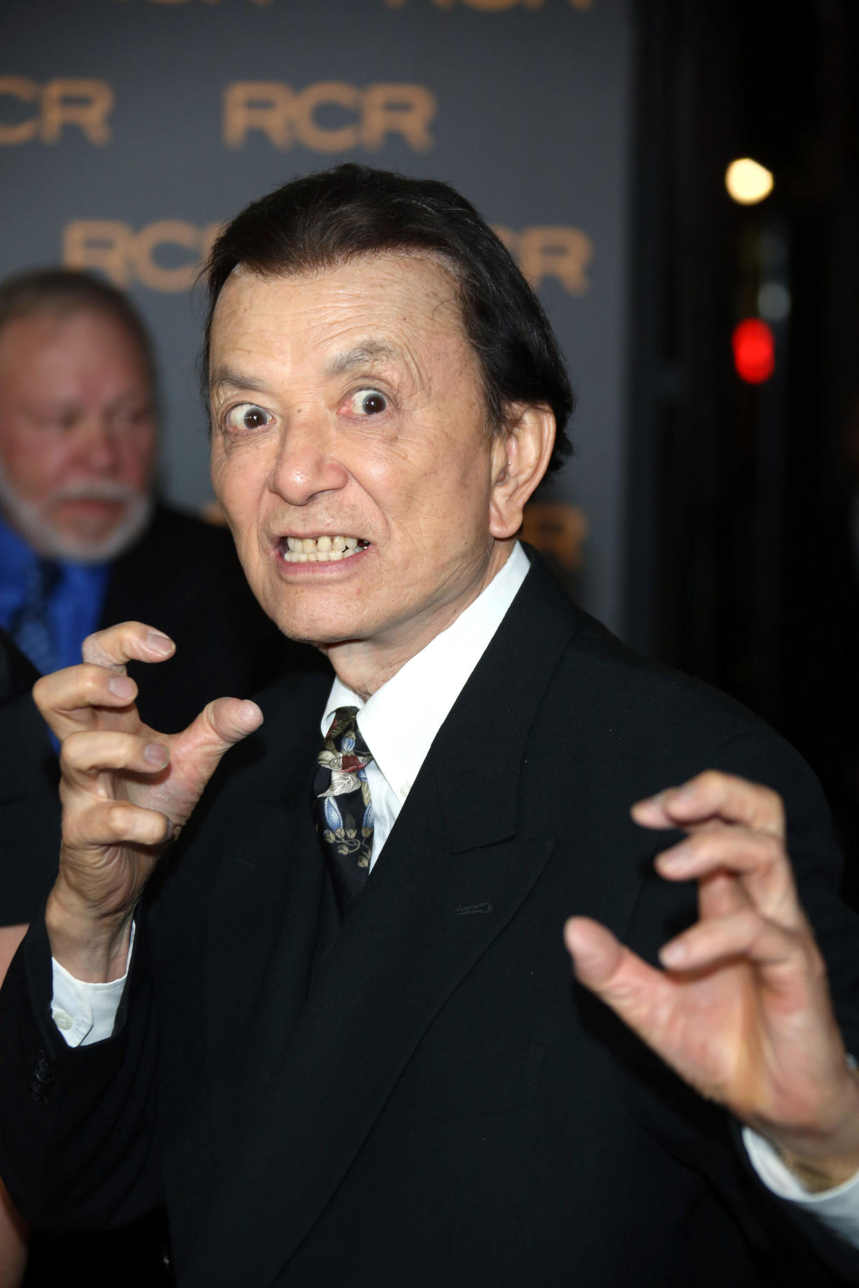 Known for his energy despite his age, Hong grinned and showed off a selection of martial arts moves for photographers on the CCA event’s red carpet (Alamy/PA)