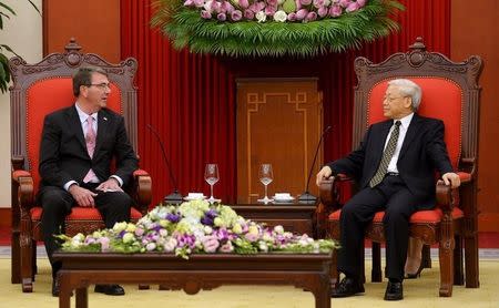 U.S. Secretary of Defense Ash Carter (L) and Vietnam's Communist Party General Secretary Nguyen Phu Trong talk at the party's headquarters in Hanoi June 1, 2015. REUTERS/Hoang Dinh Nam/Pool