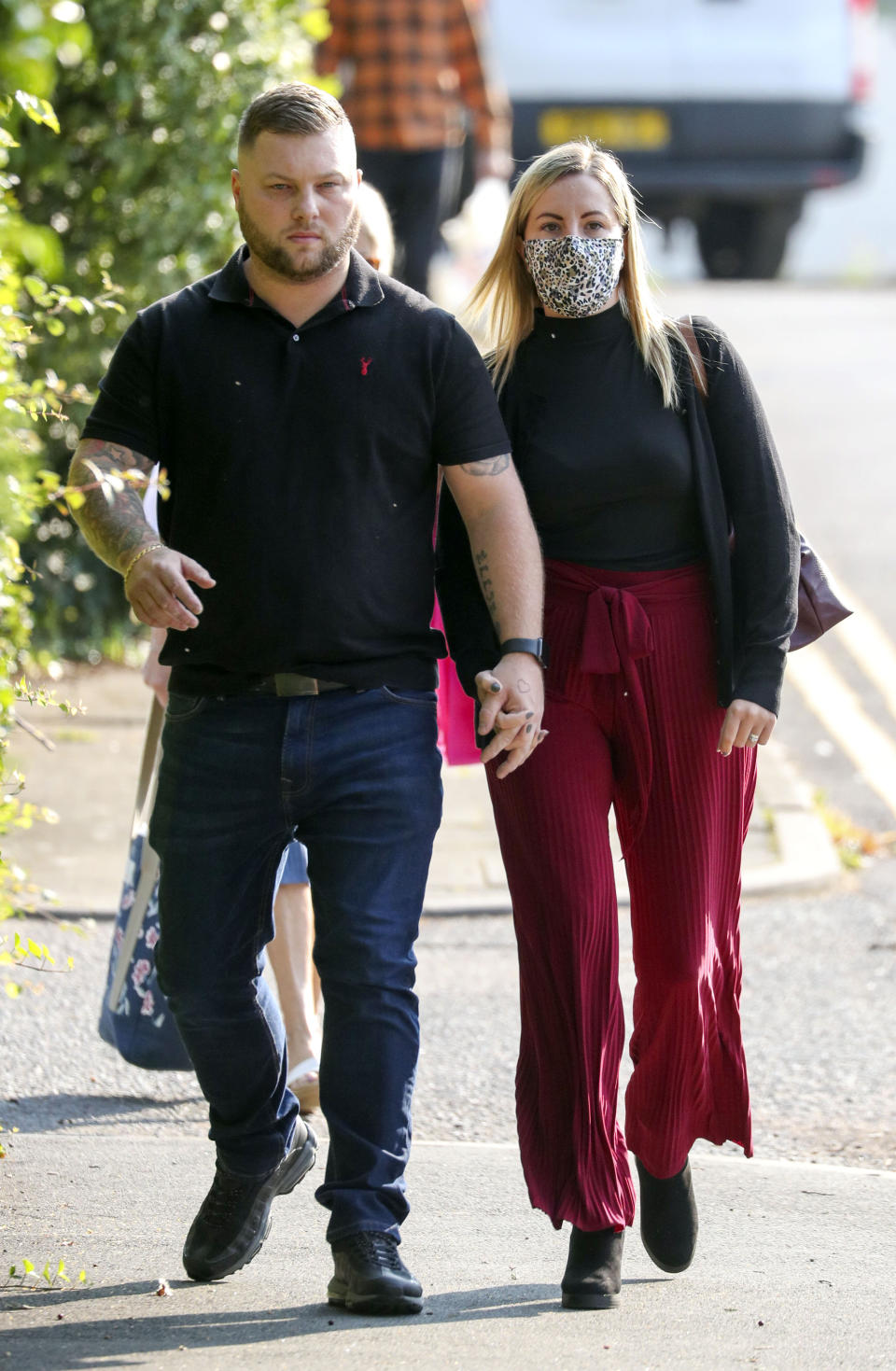 Kandice Barber, 35, arrives with her husband Daniel at Aylesbury Crown Court, Buckinghamshire. (PA Images)