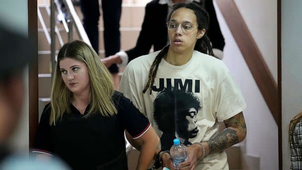 PHOTO: WNBA star and two-time Olympic gold medalist Brittney Griner is escorted to a courtroom for a hearing, in Khimki just outside Moscow, July 1, 2022. (Alexander Zemlianichenko/AP)