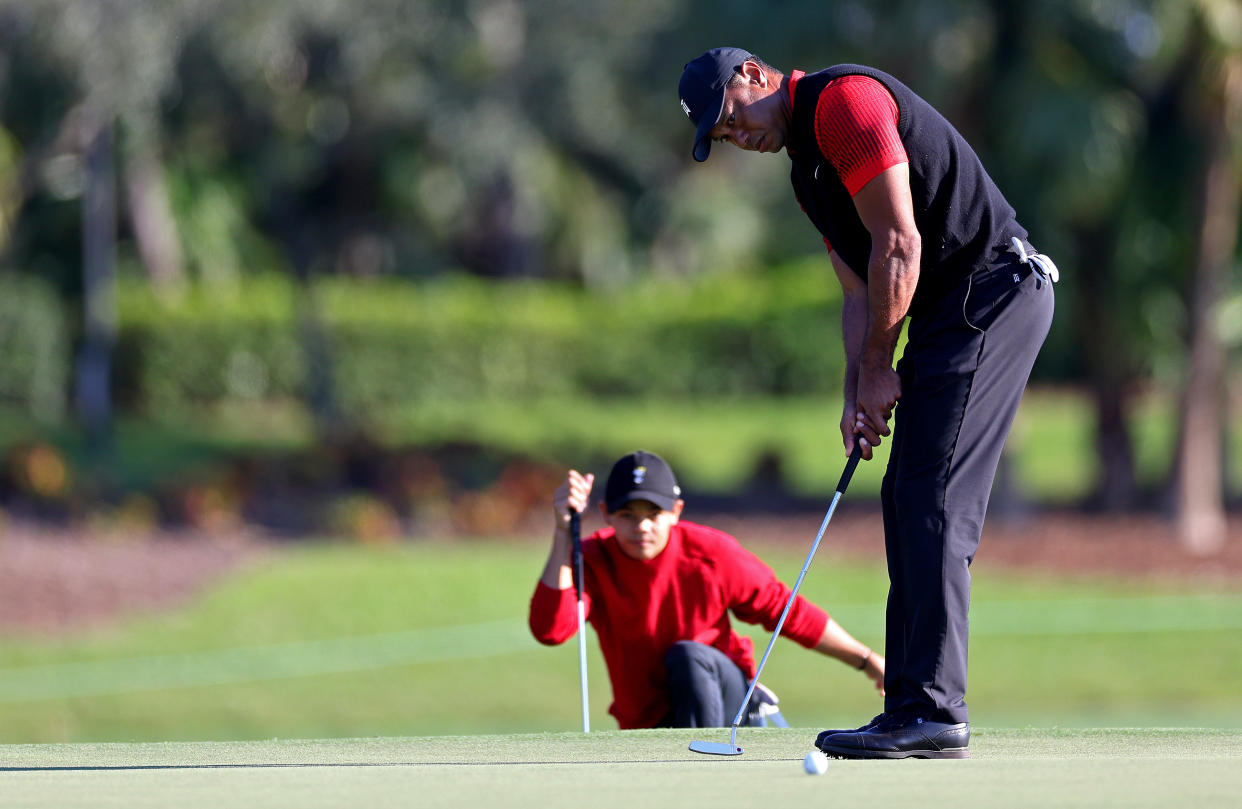 Tiger and Charlie at last year's PNC Championship. (Mike Ehrmann/Getty Images)