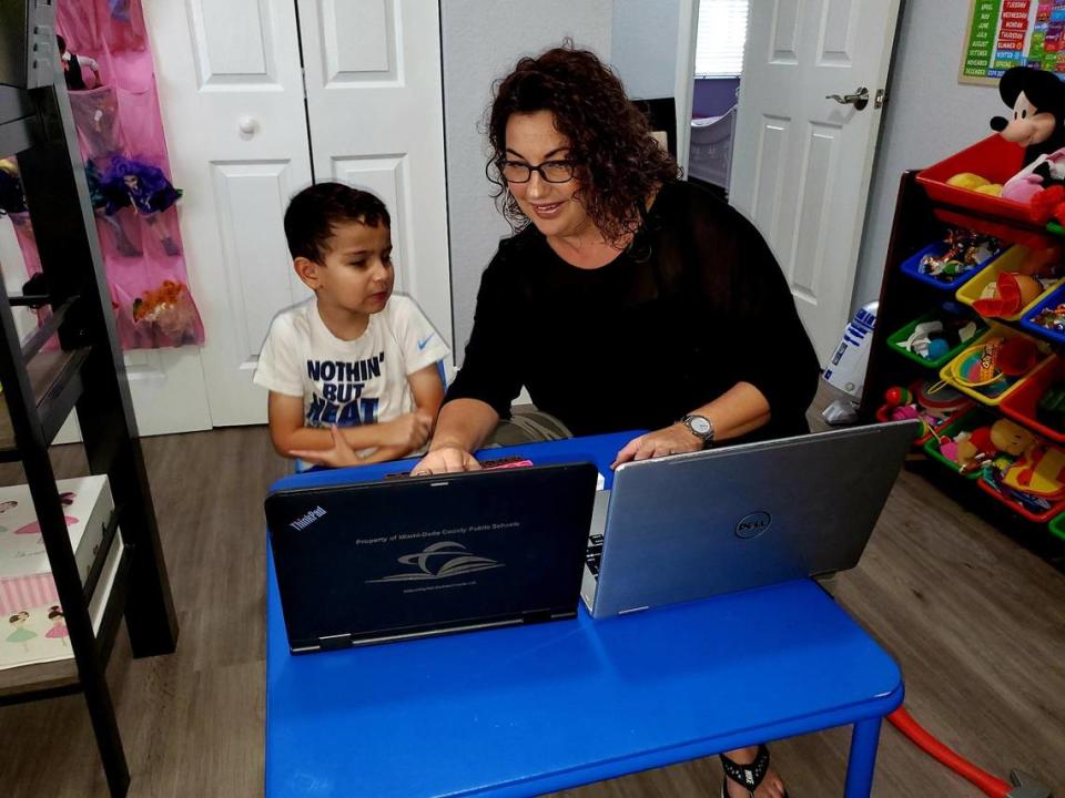 Joanna Palmer helps her 6-year-old son Marcos, who is on the autism spectrum, with remote learning. She doesn’t plan on sending him back to Whigham Elementary in Cutler Bay when in-person classes resume, as she’s concerned about the impending convergence of flu season and COVID.