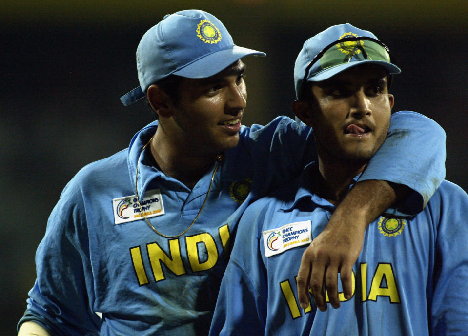 Yuvraj Singh and Sourav Ganguly of India celebrate victory after the ICC Champions Trophy semi-final match between India and South Africa held on September 25, 2002 at the R. Premadasa Stadium, in Colombo, Sri Lanka. (Photo by Clive Mason/Getty Images)