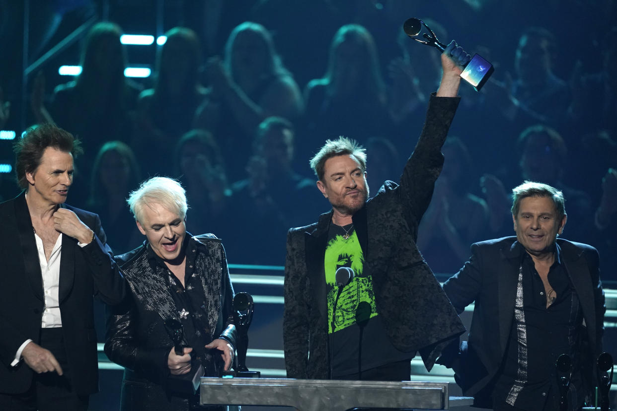 Inductees John Taylor, from left, Nick Rhodes, Simon Le Bon, and Roger Taylor of Duran Duran speak during the Rock & Roll Hall of Fame Induction Ceremony on Saturday, Nov. 5, 2022, at the Microsoft Theater in Los Angeles. (AP Photo/Chris Pizzello)