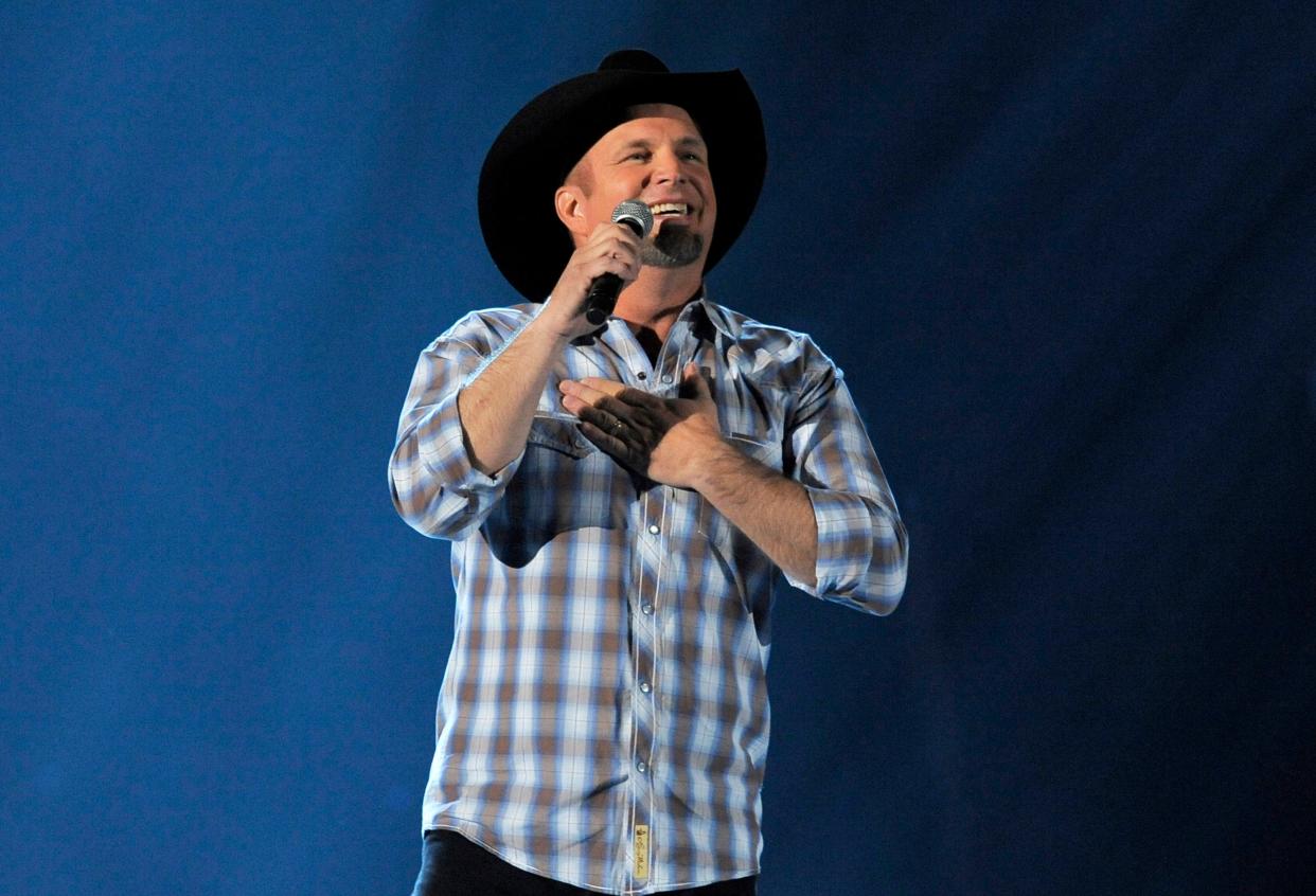 This April 7, 2013 file photo shows Garth Brooks performing at the 48th Annual Academy of Country Music Awards in Las Vegas, Nev.