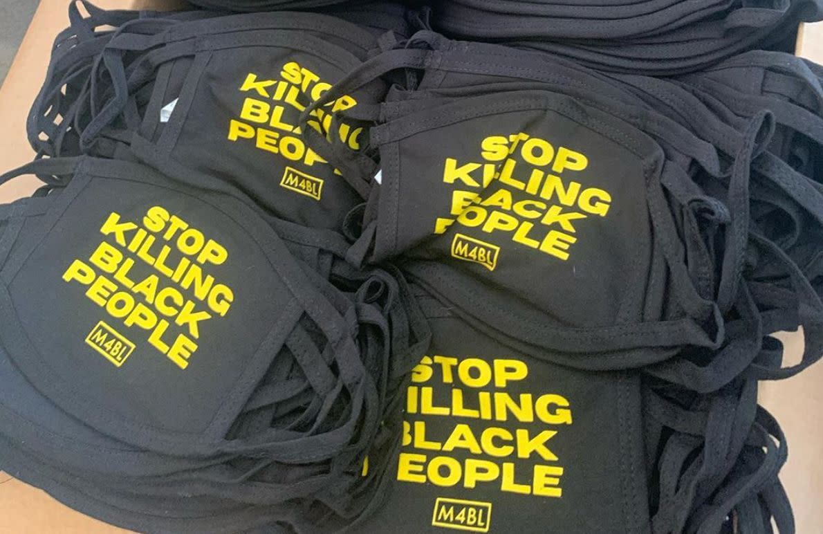 Cloth masks that read "Stop killing Black people" and were intended to protect demonstrators from COVID-19 were seized by law enforcement. (themovementink / Instagram)