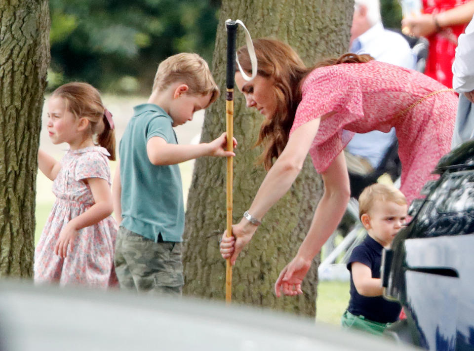 WOKINGHAM, UNITED KINGDOM - JULY 10: (EMBARGOED FOR PUBLICATION IN UK NEWSPAPERS UNTIL 24 HOURS AFTER CREATE DATE AND TIME) Princess Charlotte of Cambridge, Prince George of Cambridge, Catherine, Duchess of Cambridge and Prince Louis of Cambridge attend the King Power Royal Charity Polo Match, in which Prince William, Duke of Cambridge and Prince Harry, Duke of Sussex were competing for the Khun Vichai Srivaddhanaprabha Memorial Polo Trophy at Billingbear Polo Club on July 10, 2019 in Wokingham, England. (Photo by Max Mumby/Indigo/Getty Images)