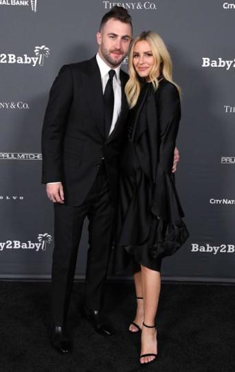 Jordan McGraw, Morgan Stewart arrives at the Baby2Baby 10-Year Gala Presented By Paul Mitchell at Pacific Design Center on November 13, 2021 in West Hollywood, California