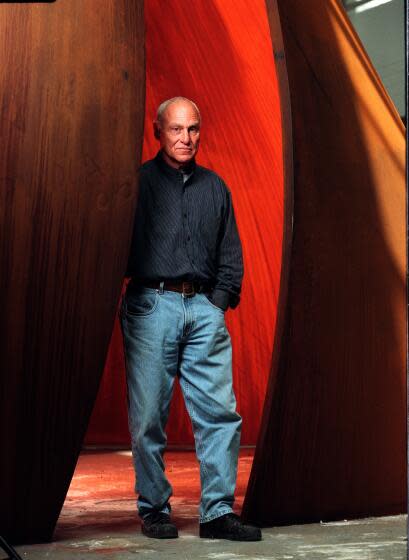 Sculptor Richard Serra with one of his steel sculptures at the Geffen Contemporary in 1998.