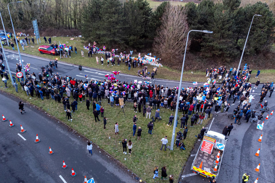 People attend a vigil in the St Mellons area of Cardiff, in memory of Eve Smith, 21, Darcy Ross, 21, and Rafel Jeanne, 24, who died in a road traffic accident, while Sophie Russon, 20, and Shane Loughlin, 32, survived but remain in a critical condition. Picture date: Tuesday March 7, 2023. (Photo by Ben Birchall/PA Images via Getty Images)