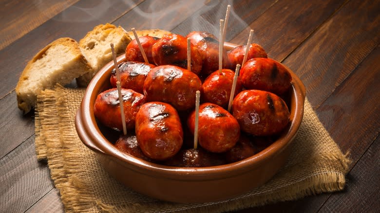 small chorizo sausages in bowl