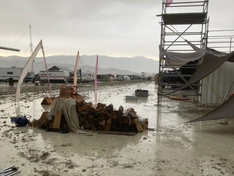 Burning Man camps covered in rain and mud.