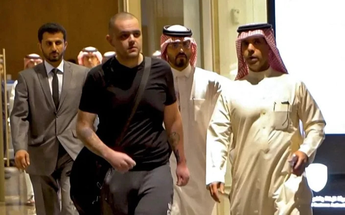 Aiden Aslin arriving in Saudi Arabia after being released from captivity in Russia - AFP via Getty Images