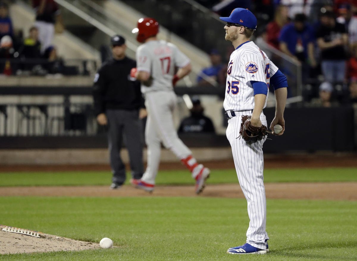 Rhys Hoskins dropped the ball & had to hold back his Fist Pump