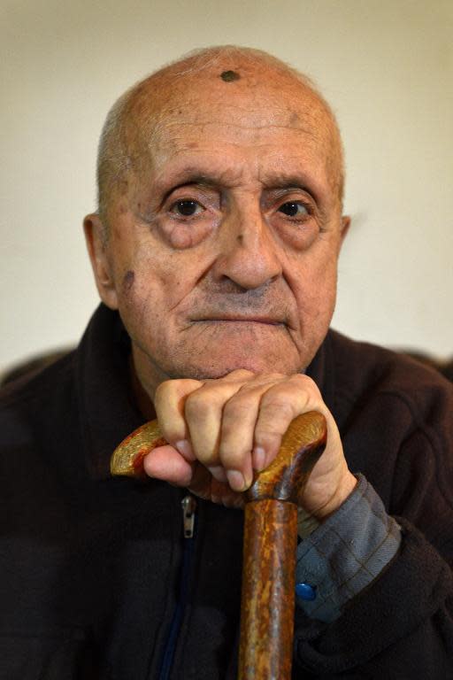 A picture taken on March 24, 2015 shows 105-year-old survivor Khosrov Frangyan as he poses in Ejmiatsin outside Yerevan