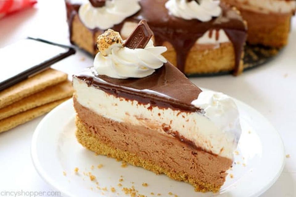 <p>Graham crackers, marshmallows, and chocolate all in one cheesecake! </p><p><strong>Get the recipe: </strong><a href="https://cincyshopper.com/no-bake-smores-cheesecake/" rel="nofollow noopener" target="_blank" data-ylk="slk:No-Bake S’mores Cheesecake;elm:context_link;itc:0;sec:content-canvas" class="link "><strong>No-Bake S’mores Cheesecake</strong></a></p>
