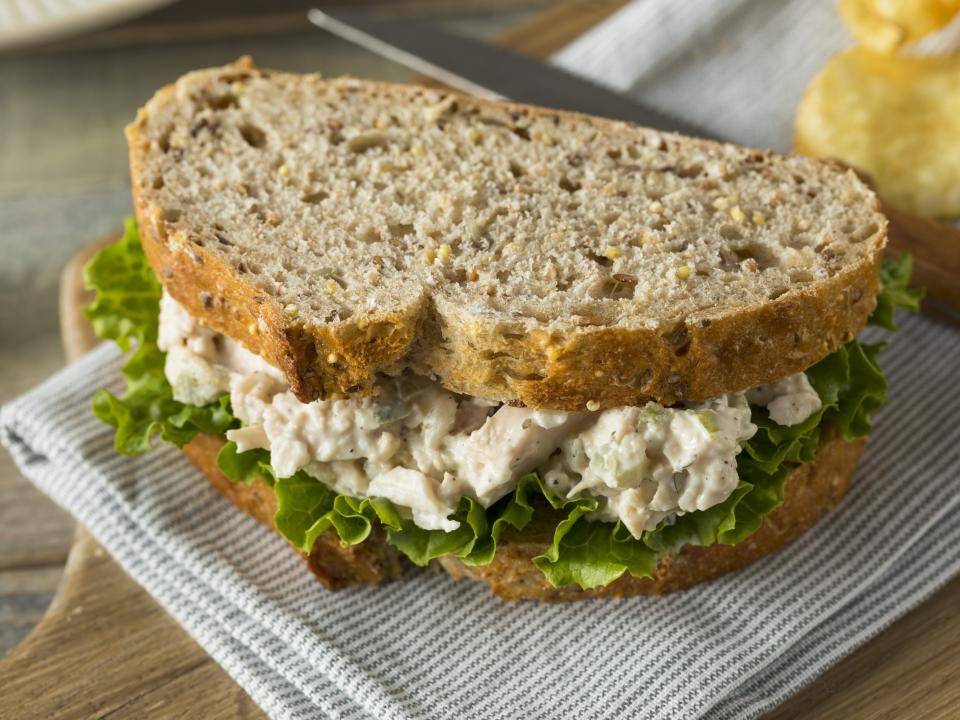 chicken salad sandwich on a napkin