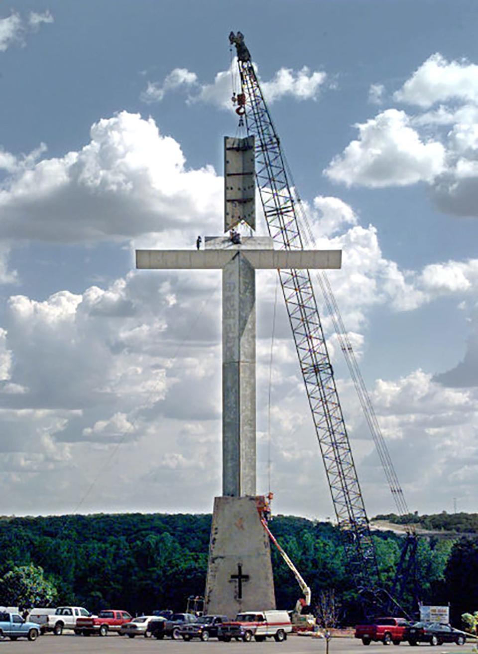 In this 1998 photo, a cross tower is built on MetroChurch property on the Interstate 35 corridor at Second Street in Edmond.