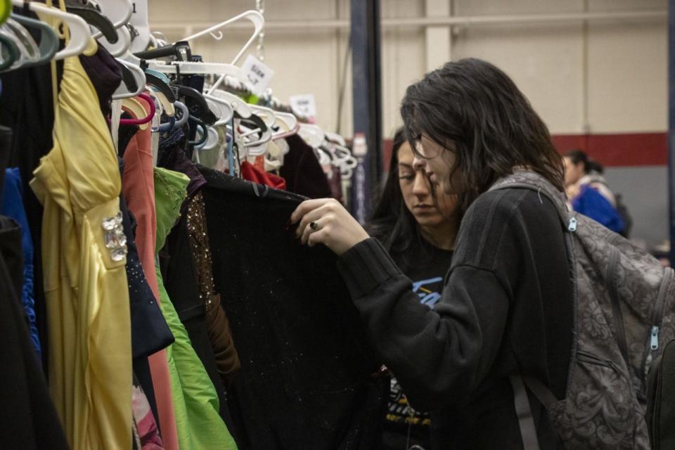 Alliance High School students take part in Project Prom on March 17, 2023. As part of the program, students can pick out prom attire, shoes and accessories at no cost.