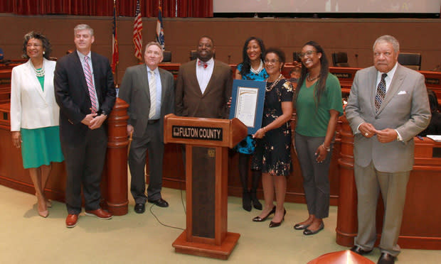 Judge Gail Tusan (center) poses with members of the Fulton County Commission after receiving a proclamation honoring her service on the Fulton County Superior Court. (Photo: John Disney/ALM)