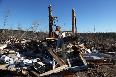 The remains of a home sit destroyed after two deadly back-to-back tornadoes, in Beauregard, Alabama, U.S., March 6, 2019. REUTERS/Shannon Stapleton