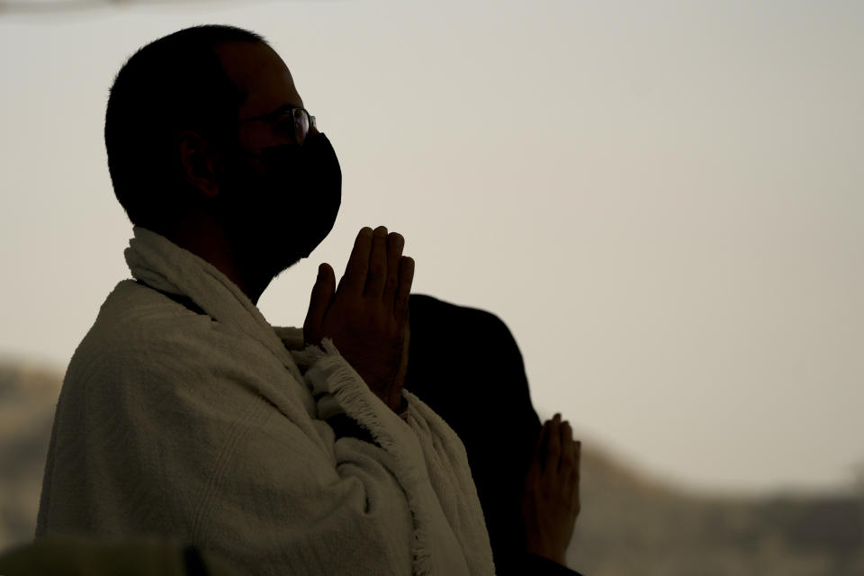 Pilgrims pray after they cast stones at a pillar in the symbolic stoning of the devil, the last rite of the annual Hajj pilgrimage, in Mina near the holly city of Mecca, Saudi Arabia, Wednesday, June 28, 2023. (AP Photo/Amr Nabil)