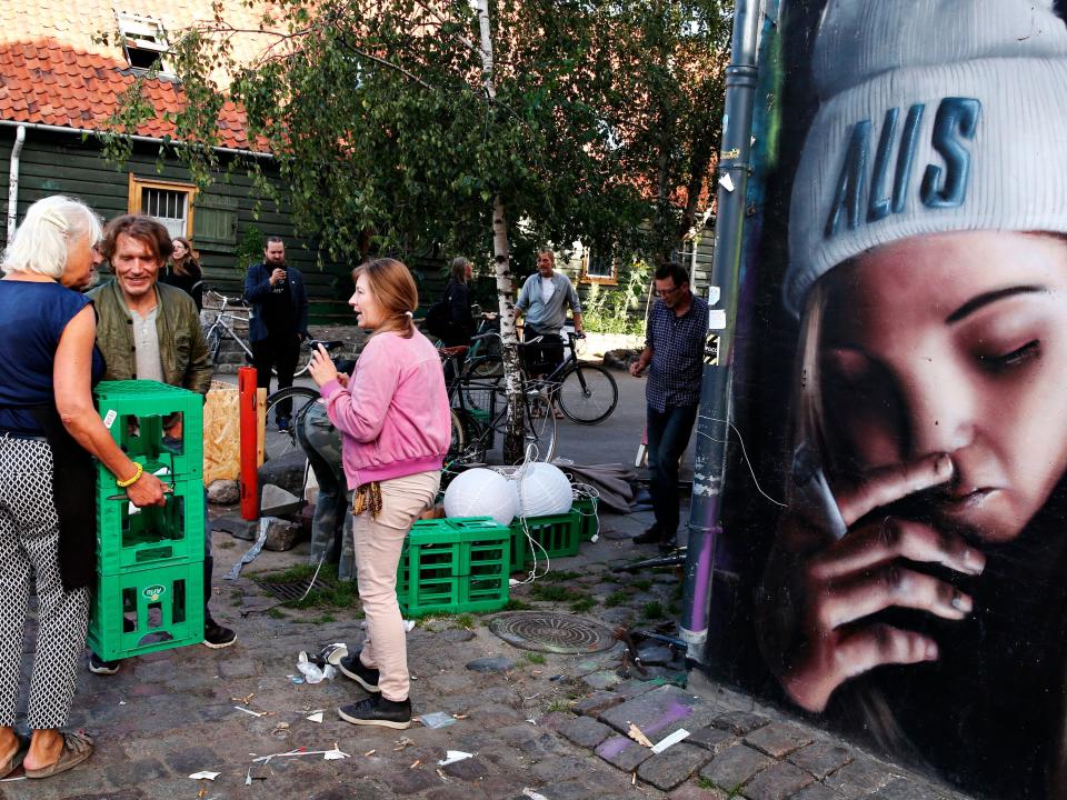 Residents inside Christiania talking in 2016.
