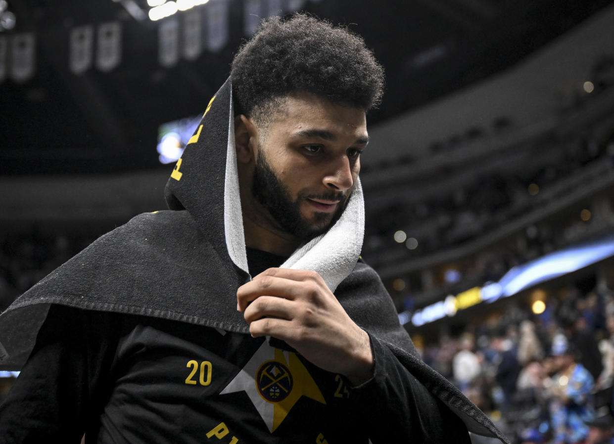 Jamal Murray made a bad night on the court worse during a moment of frustration on the bench. (AAron Ontiveroz/The Denver Post)