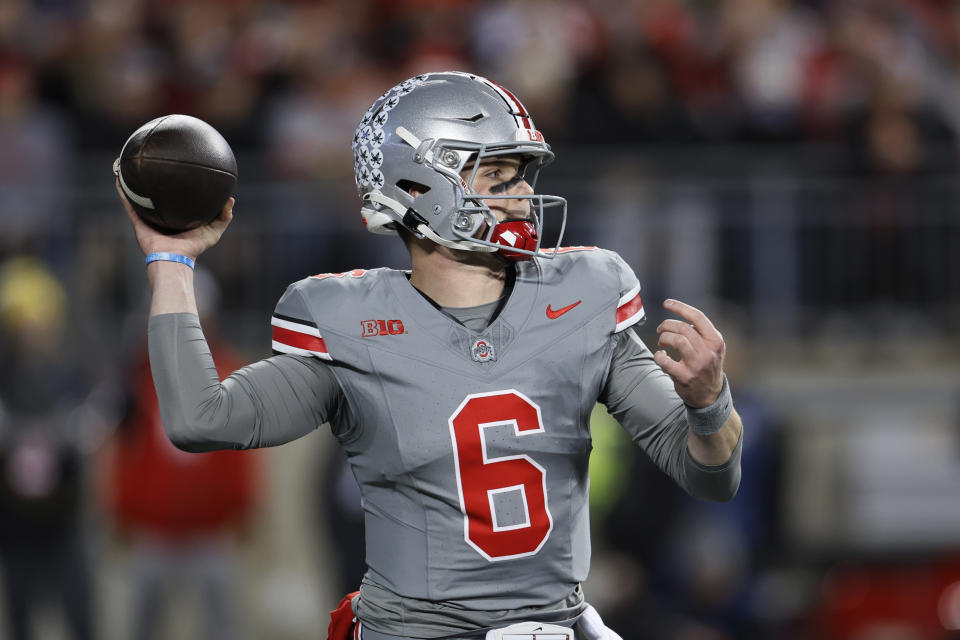 Ohio State quarterback Kyle McCord throws a pass against Michigan State during the first half of an NCAA college football game Saturday, Nov. 11, 2023, in Columbus, Ohio. (AP Photo/Jay LaPrete)