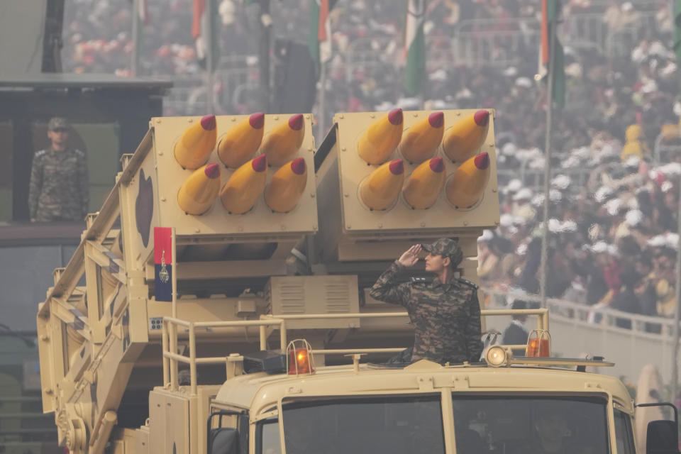 Indian Army multi rocket launcher vehicles drive through the on the ceremonial street Kartavyapath during India's Republic Day parade celebrations in New Delhi, India, Friday, Jan. 26, 2024. (AP Photo/Manish Swarup)