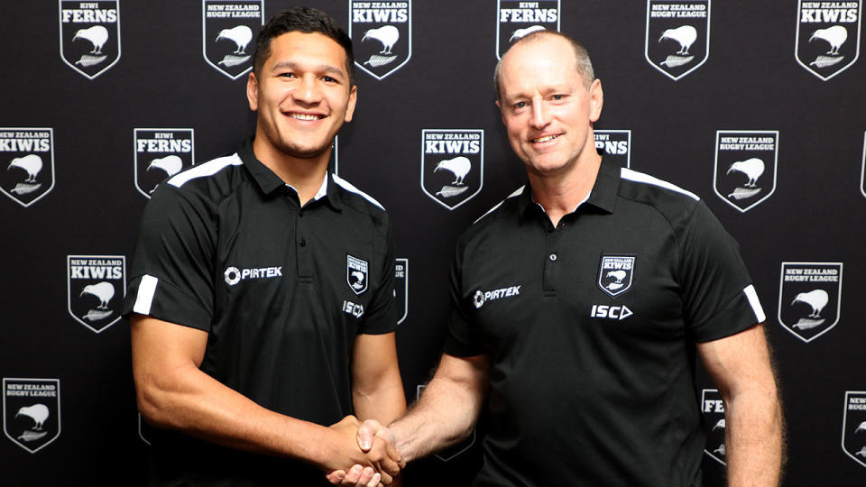 Kiwis coach Michael Maguire (R) and captain Dallin Watene-Zelezniak (L) shake hands during a New Zealand Kiwis press conference at Mt Smart Stadium. Pic: Getty