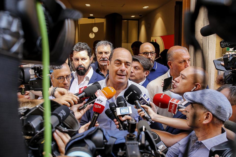 Secretary of the Italian Democratic Party (PD), Nicola Zingaretti, talks to the press outside the centre-left party headquarters in Rome, Italy, Monday, Aug. 26 2019. ingaretti challenged the 5-Stars to agree to a government whose planks would be a clear break with those of the coalition that just collapsed. (Fabio Frustaci/ANSA via AP)