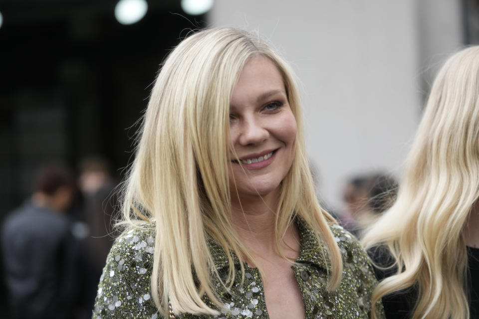 Actress Kirsten Dunst leaves at the end of the unveiling of the Gucci women's Fall-Winter 2024-25 collection presented in Milan, Italy, Friday, Feb. 23, 2024. (AP Photo/Luca Bruno)