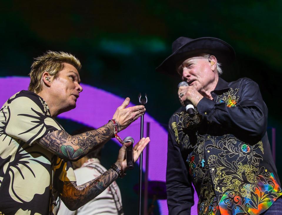 Mark McGrath (left) performs with frontman Mike Love of The Beach Boys perform in the Palomino tent during Stagecoach country music festival in Indio, Calif., Sunday, April 28, 2024.
