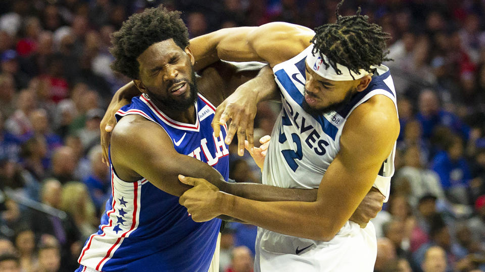 Joel Embiid and Karl-Anthony Towns, pictured scuffling during the Philadelphia 76ers' clash with the Minnesota Timberwolves.