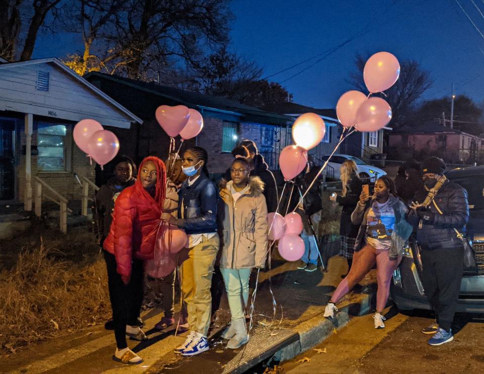 Instead of honoring their classmate with a balloon release on the grounds of her high school, the students, banned from campus after hours, left the large empty parking lot and huddled across the street on a small sidewalk.