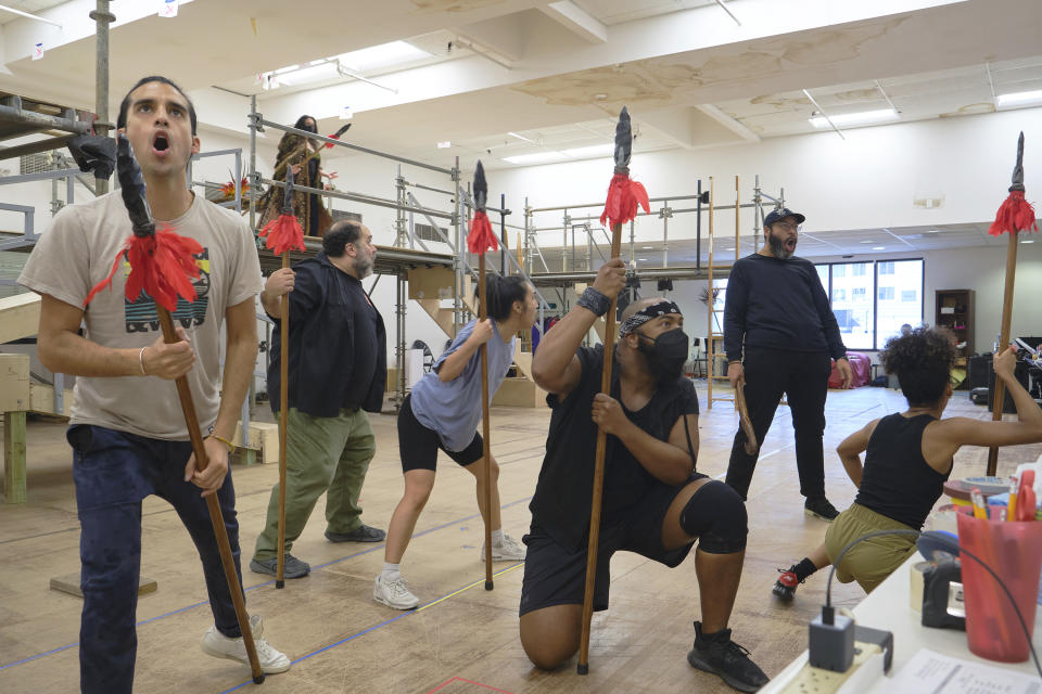 Cast members of the musical comedy “Kiss My Aztec!” rehearse in Hartford, Conn., on May 12, 2022. The show, co-written by John Leguizamo and director Tony Taccone, will play at Hartford Stage from June 1 to June 26. (Alan Arias via AP)