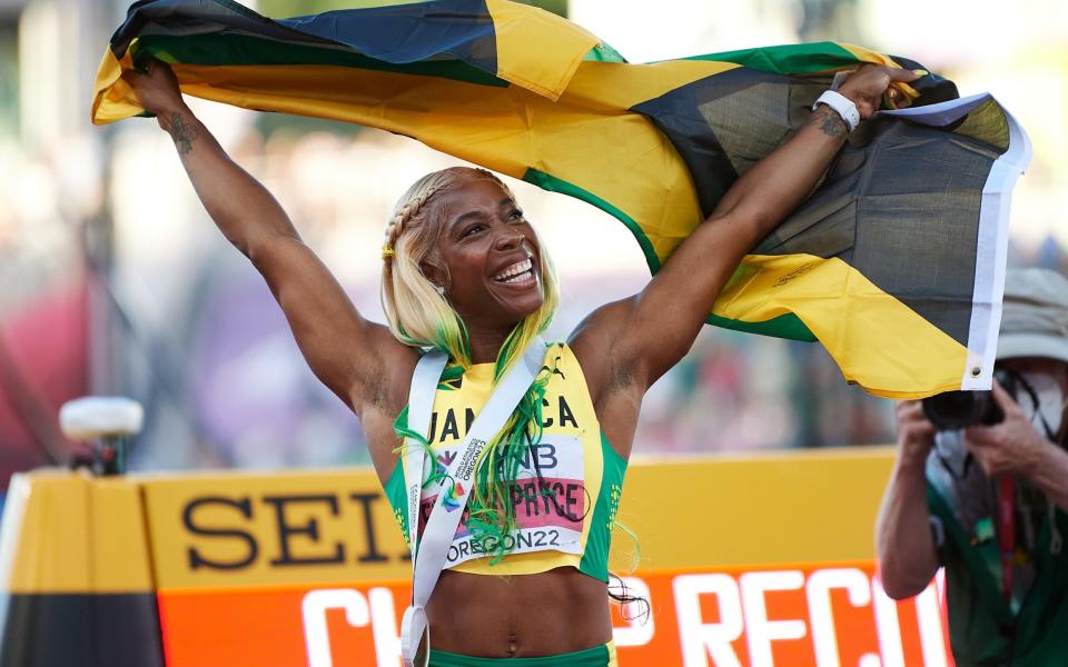 Shelly-Ann Fraser-Pryce celebrates after winning the 100m final - Shutterstock