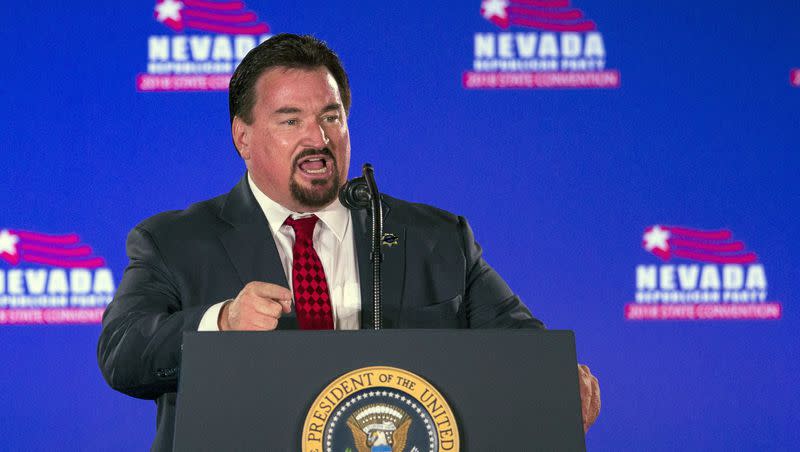 Nevada state GOP Chairman Michael McDonald announces President Donald Trump before Trump speaks at the Nevada Republican Party Convention on June 23, 2018, in Las Vegas.