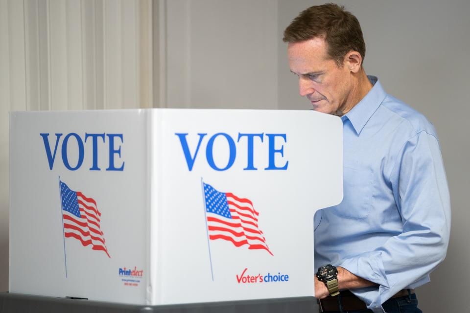 Republican senatorial candidate Rep. Ted Budd votes at Farmington Baptist Church on Nov. 8, 2022, in Mocksville, North Carolina. Budd is facing Democratic U.S. Senate candidate Cheri Beasley in today's general election.